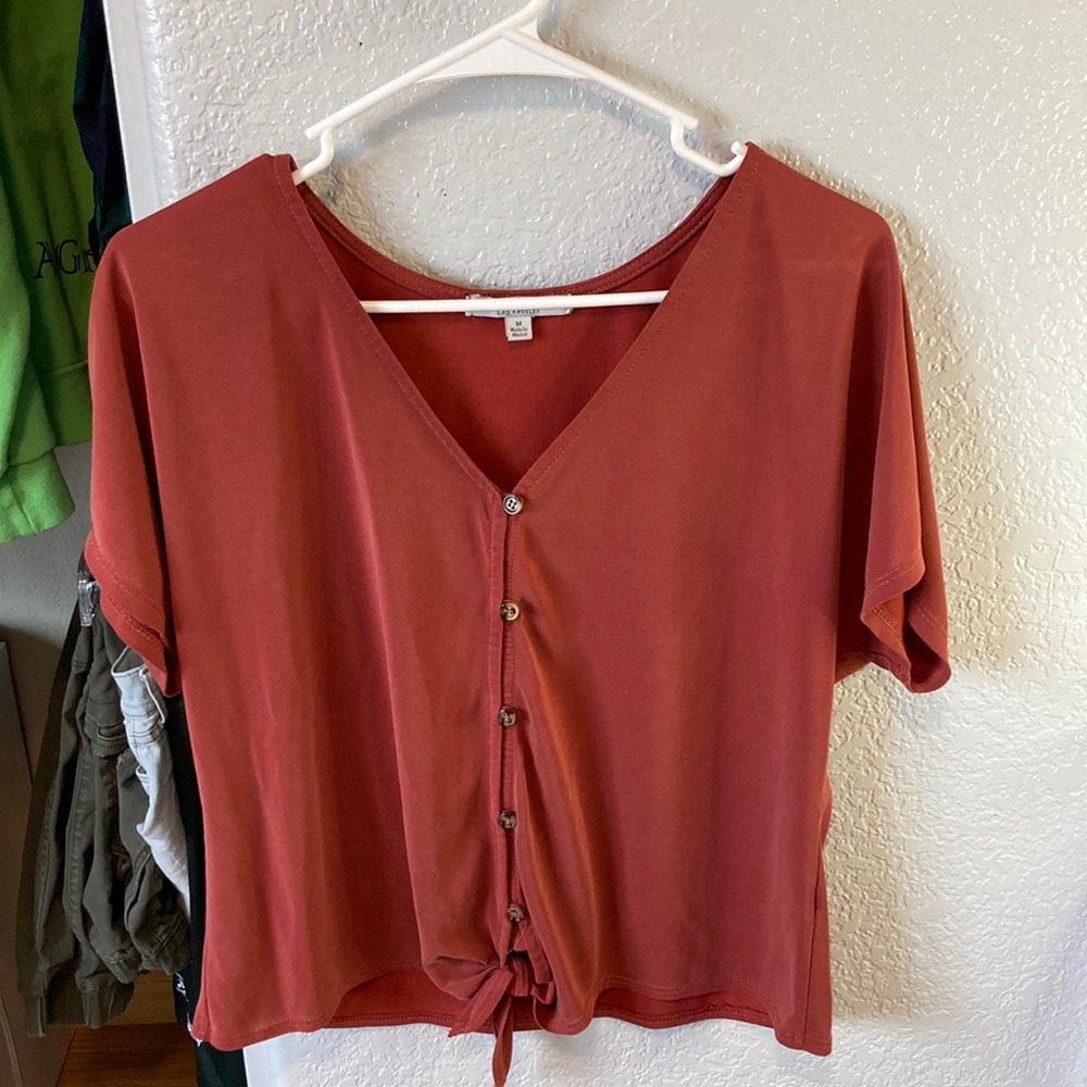 Semi cropped button down tie front top.